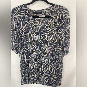 Chicos Travelers blue and gray top, with a unique neck line. Slinky and cute!